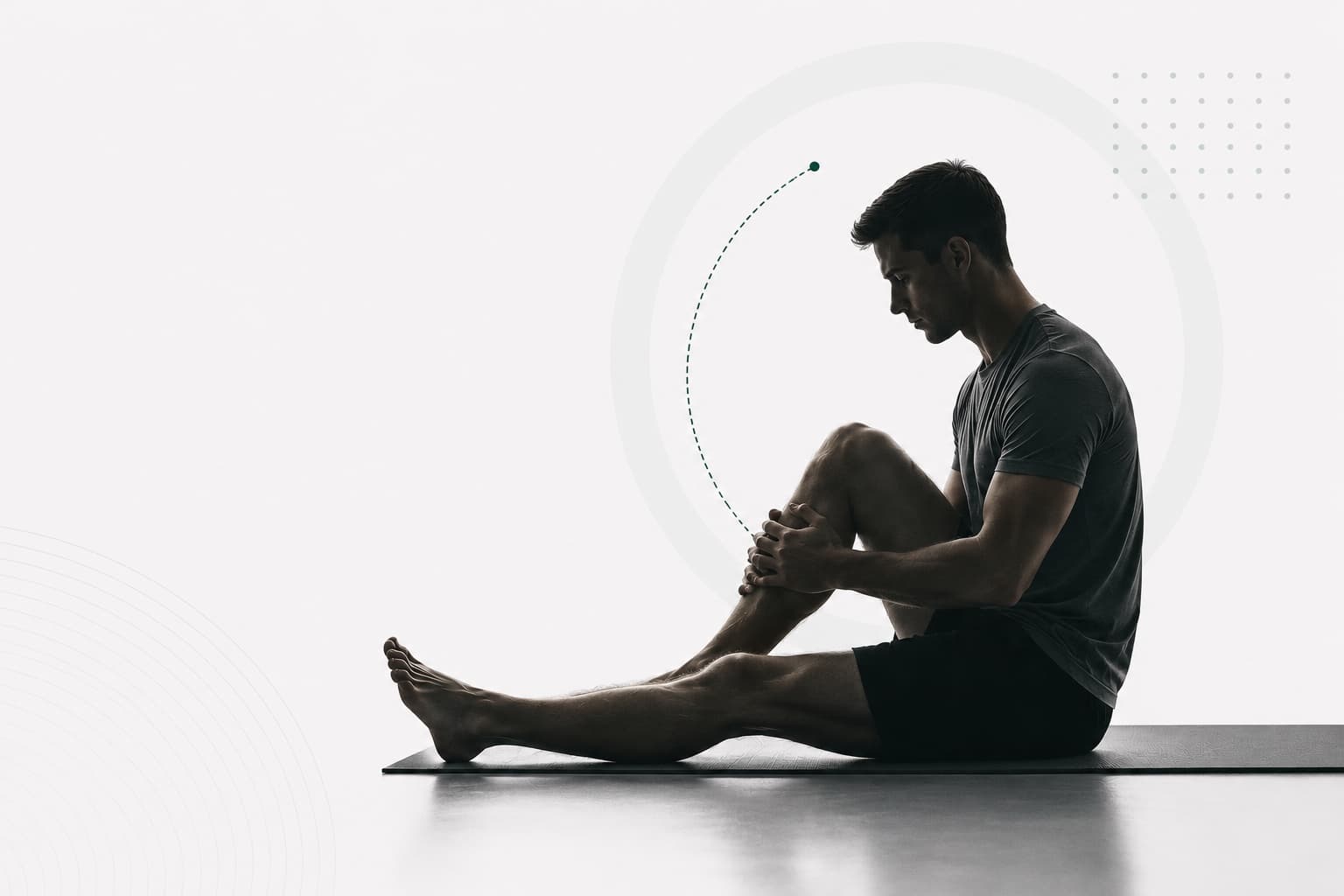A man in silhouette stretching on a mat during rehabilitation